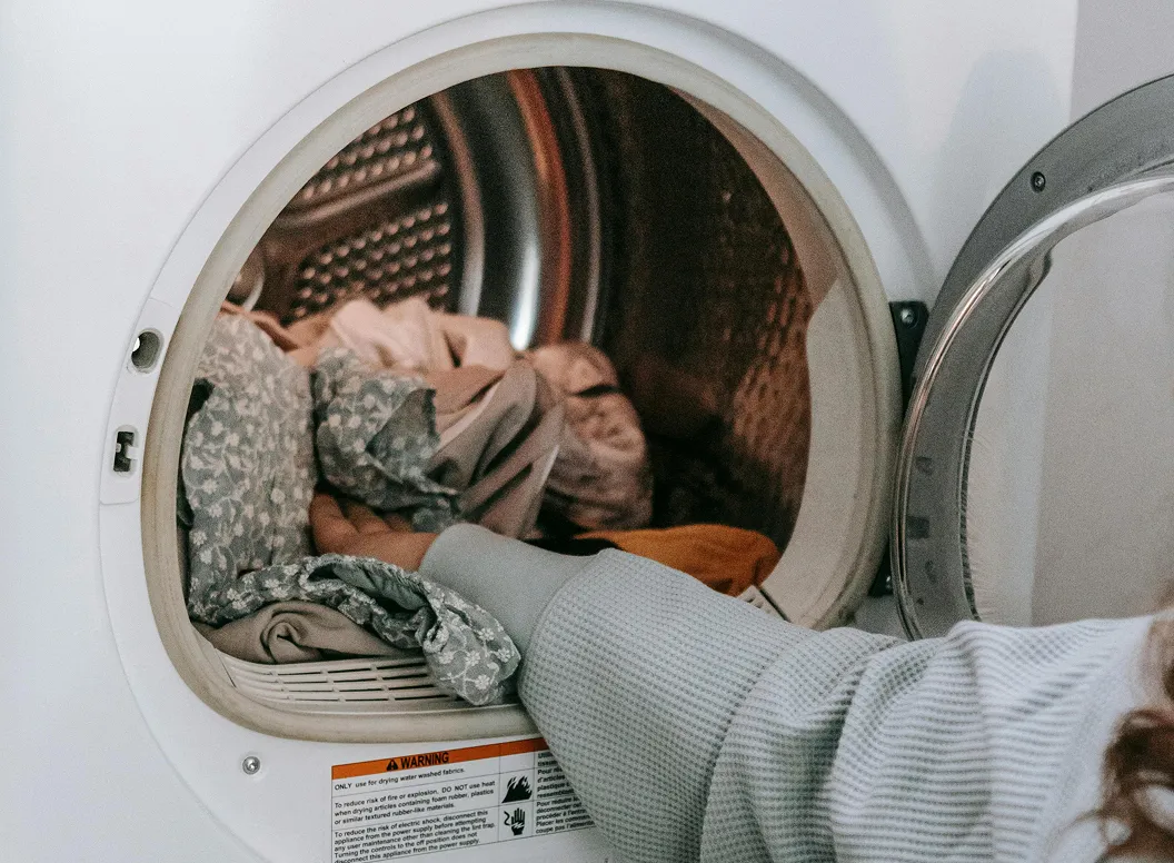A helper doing laundry